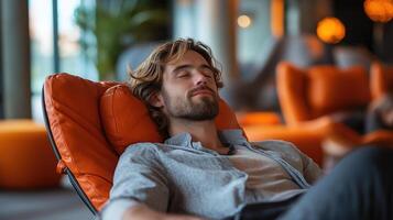 A Professional's Moment of Relaxation in a Stylish Office, A professional enjoying a moment of relaxation in a well-designed office space photo