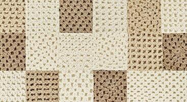A rug with a square pattern of squares photo