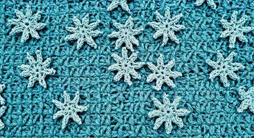 A close up of a crocheted snowflake pattern photo