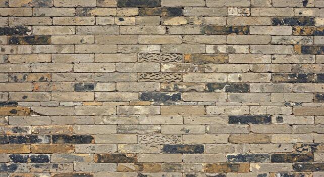 A brick wall with a clock on it photo