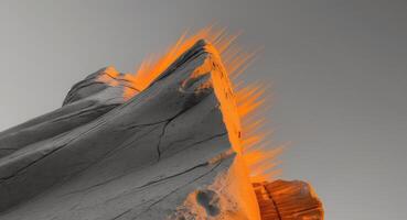 A rock with orange flames on top of it photo