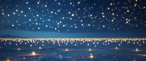 A field of candles lit up in the night sky photo