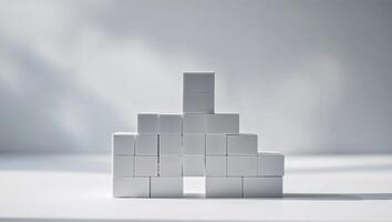 Close up view of a stack of white building blocks. photo