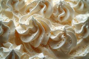 Creamy swirls of frosting adorned with golden beads photo