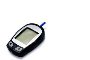 Glucose meter with sheet check isolate on white background and make with paths. photo