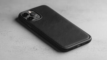 Stylish Minimalist Black Leather Phone Case for Modern Aesthetics and Everyday Use in Light Settings photo