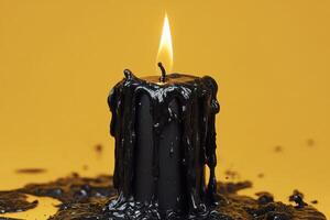 A Captivating Black Candle Melting Against a Luxurious Golden Background for Home Decor photo