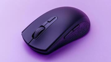 A stylish and functional minimalist black wireless mouse placed on a soft pastel background that enhances modern workspace aesthetics, perfect for tech enthusiasts and professionals alike. photo