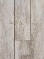 A close-up shot showcasing a gray wooden floor, highlighting the texture and pattern of the wood grain. Ideal for backgrounds or textures. photo