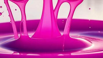 Pink liquid splashing, creating ripples, dynamic fluid motion video