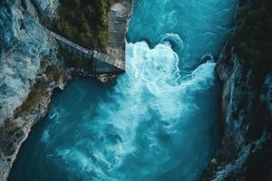An aerial view of a river flowing through a canyon photo