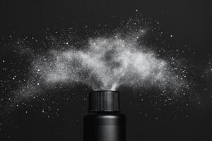 Black Aerosol Can Producing a Powder Cloud Against a Light Background photo