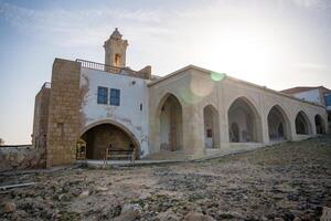 Monastery of Apostle Andrew stands near the northeasternmost cape of Northern Cyprus. The image highlights a sacred pilgrimage site and its historical and spiritual significance. High quality photo