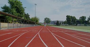 A running track with a person running on it video