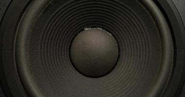 A close up of a speaker with a black background video