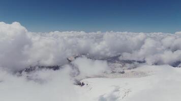 A high altitude view of the mountains, shrouded in clouds. video