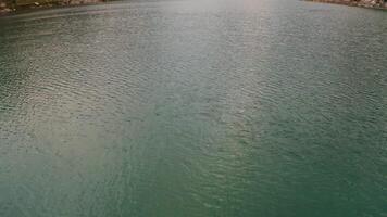 drone view of floating down a river in the middle of a lake video