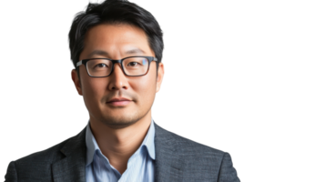 Professional man in glasses wearing a blazer with a confident expression against a plain backdrop png
