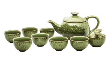 Teapot set with intricate green designs displayed with matching cups in an elegant arrangement png