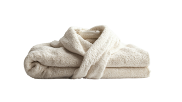 Luxurious cream bathrobe neatly folded showcasing soft texture in a serene indoor setting png