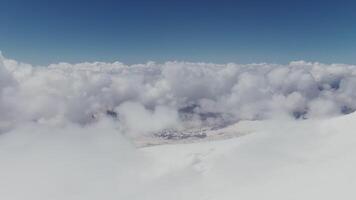 Looking down at the clouds, view from the top of a mountain video