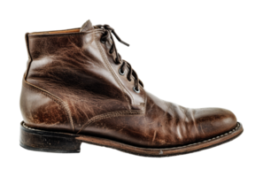 Worn brown leather boot with laces and distressed texture, cut out png