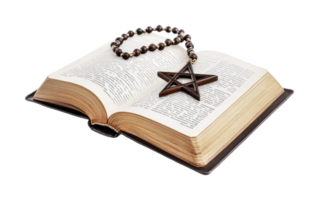 Open spellbook with pentagram necklace on pages of magical text, cut out png