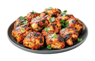 Delicious grilled chicken tikka with fresh cilantro garnish on a black plate png