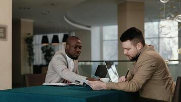 Teamwork meeting, laptops and business people in office workplace. Collaboration, technology and workers, men or employees with touchscreen planning sales, research or financial strategy in company video