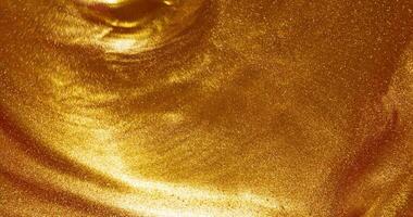 Golden sand liquid texture background photo