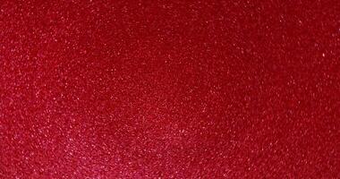 A red background with a white spot in the center photo