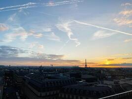 Scenic view of Paris skyline with Eiffel Tower during sunset photo