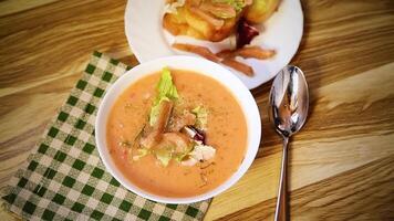 Fish soup. Dietary fish soup-puree with salmon on a light background. video