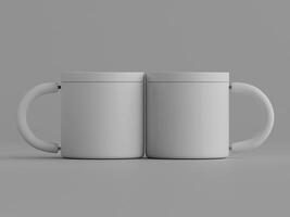 two plain mugs standing close together handles facing out soft lighting grey background photo