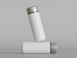 white insulated bottle balanced on horizontal bottle grey background soft shadows photo