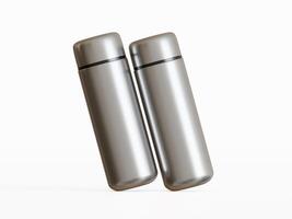 two silver mini water bottles leaning together white background soft lighting photo