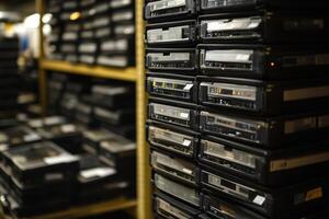 A stack of old black floppy disks photo