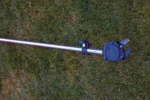 Garden pruner for high-altitude work. Close-up photo