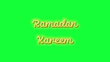 Ramadan greeting . Ramadan Kareem animated text in gold color with green screen background video