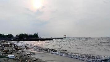 Beach in the afternoon enjoying the sunset. video