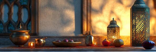 A table with a lamp, a candle and a vase photo