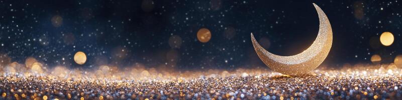 Golden crescent on a glittery background photo