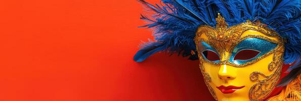 A colorful carnival mask with blue feathers on an orange background photo