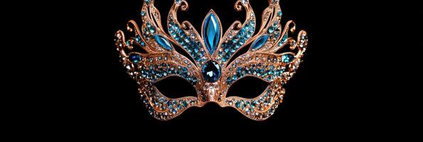 A blue and gold masquerade mask on a black background photo