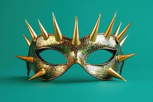A gold and black mask with spikes on it photo