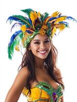Beautiful young woman in brazilian costume with colorful feathers photo