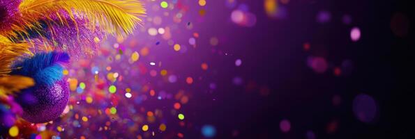 A colorful feather and a colorful mask on a black background photo