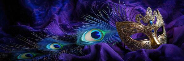 A masquerade mask and peacock feathers on a purple cloth photo