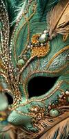 A green and gold mask with feathers photo