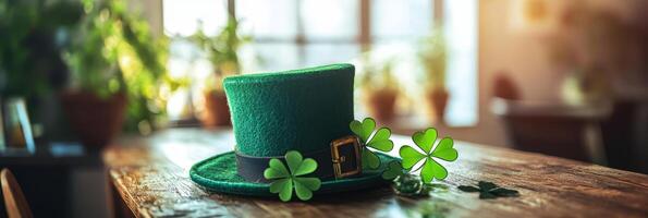 St patrick's day hat and shamrock on wooden table photo